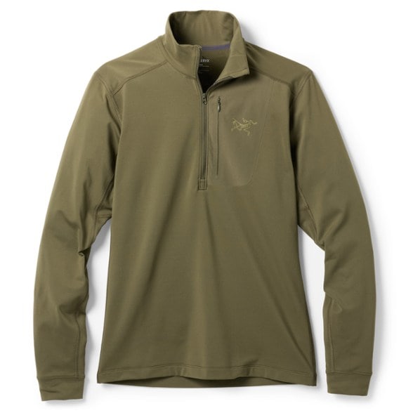 Men's Rho LT Zip-Neck Top displayed outdoors, highlighting moisture-wicking capabilities.