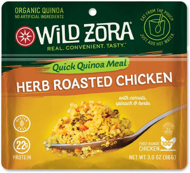Wild Zora Herb Roasted Chicken Quinoa Bowl served in a bowl with herbs and spices