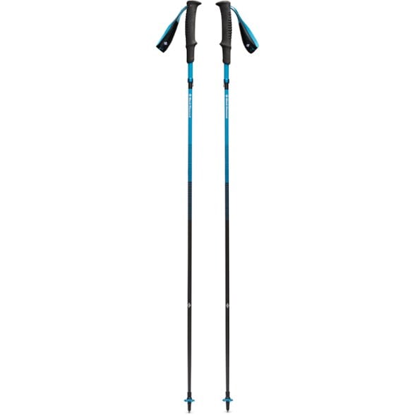 Carbon Z trekking poles on a rocky trail, showcasing their lightweight design.