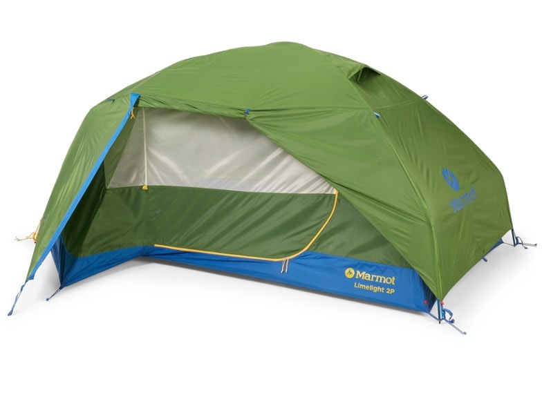 Marmot Limelight 2P tent with footprint in a wooded area, demonstrating easy setup and spacious design.