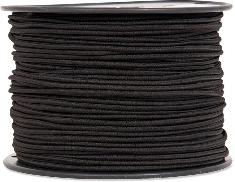 Close-up of black 1/8 inch shockcord coiled neatly for tent repair use