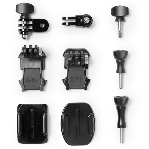 GoPro accessories kit with adhesive mounts displayed on a flat surface
