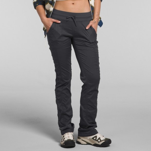 Aphrodite 2.0 pants in action on a hiking trail, highlighting their flexibility and fit.