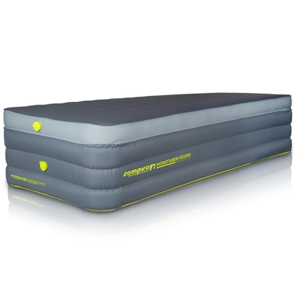 Zempire Monstabed camping mattress set up in a tent, showcasing its thickness and comfort.
