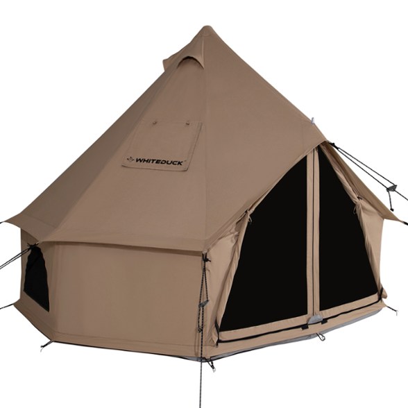 4-person bell tent set up in a winter landscape, showcasing the stove jack feature.