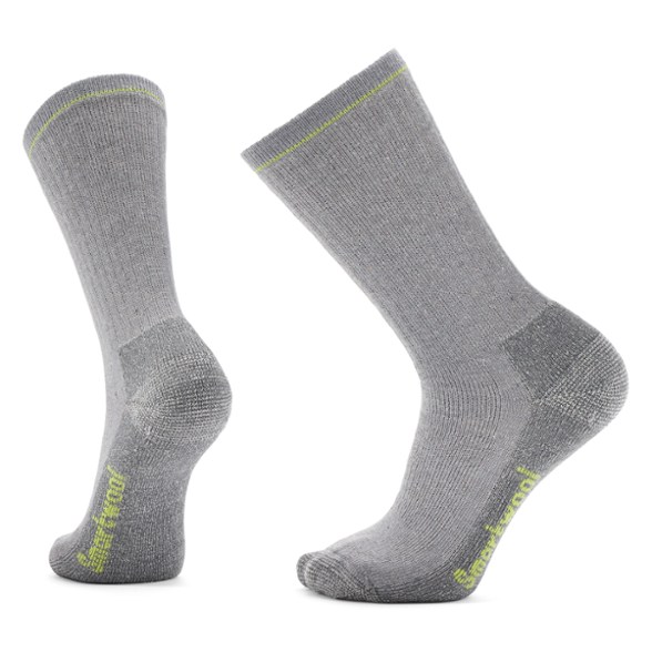 Close-up of eco-friendly merino wool hiking socks showcasing heavy cushioning and durable fabric.