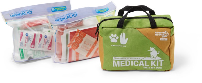 Trail Buddy Pet First Aid Kit open, displaying various first aid supplies for hiking with dogs.