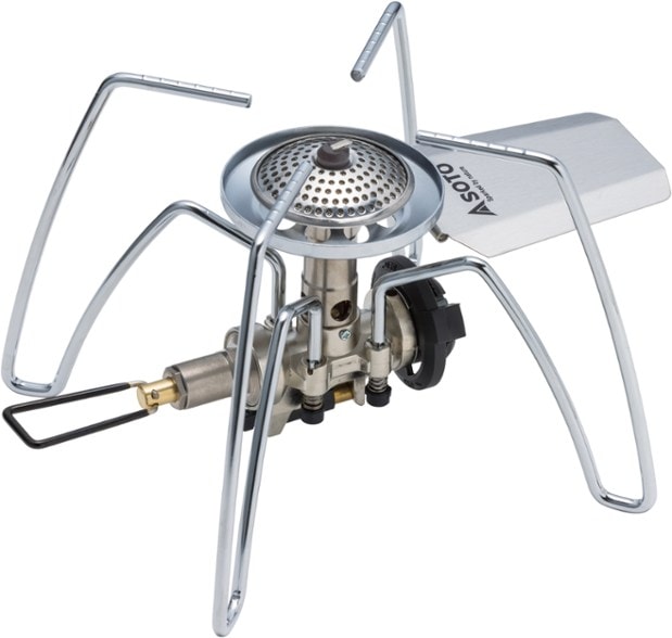 Side view of Soto TrailMaster Micro Stove in action boiling water in a snow-covered campsite
