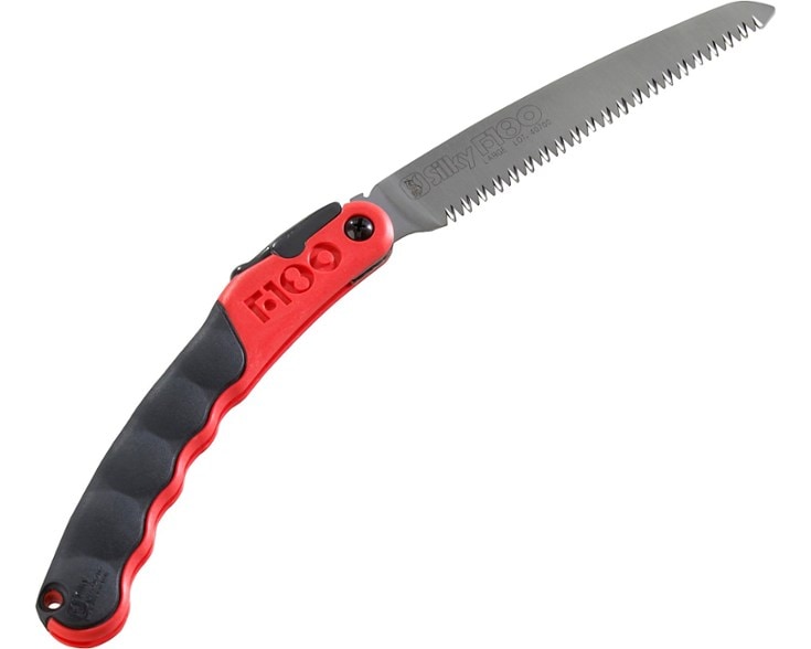 Silky F180 folding saw with a 7-inch blade cutting firewood.