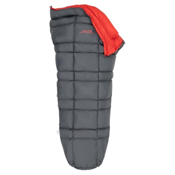 Pinnacle 35 quilt in use during a camping trip, highlighting its lightweight design and warmth.