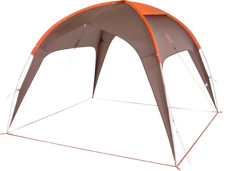 Canyon Breeze camping canopy set up at a sunny picnic site, showcasing its spacious interior and stability against the wind.