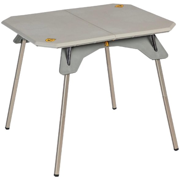 NEMO Moonlander table set up for a picnic, demonstrating its dual height functionality.